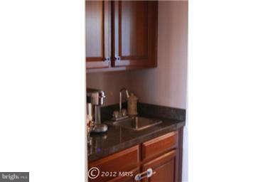 9129 Travener Circle Frederick, MD 21704 - Photo 10 of 28 a kitchen with a sink and cabinets