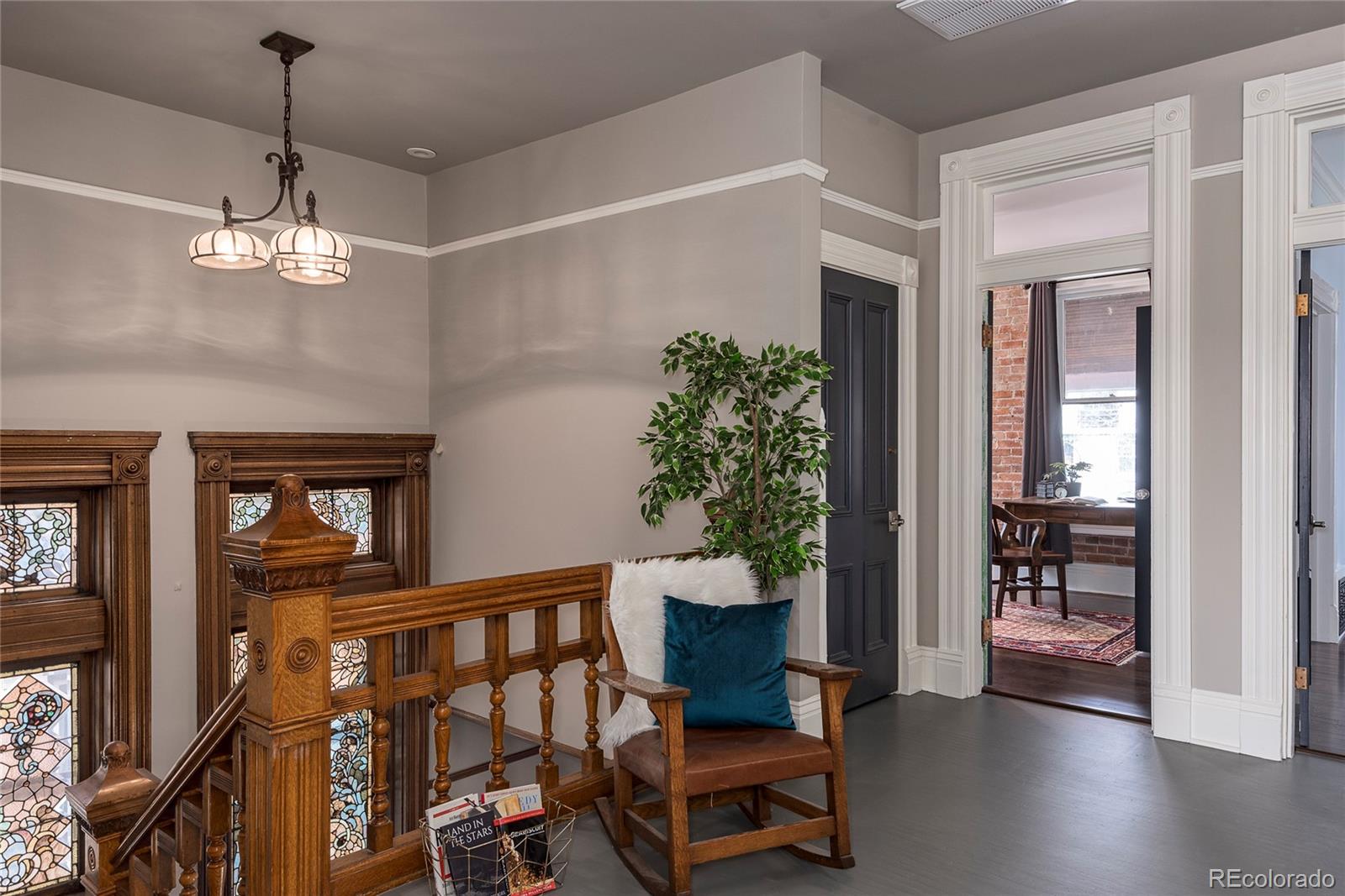 131 Sherman Street Denver, CO 80203 - Photo 16 of 36 a view of a livingroom with furniture and hardwood floor