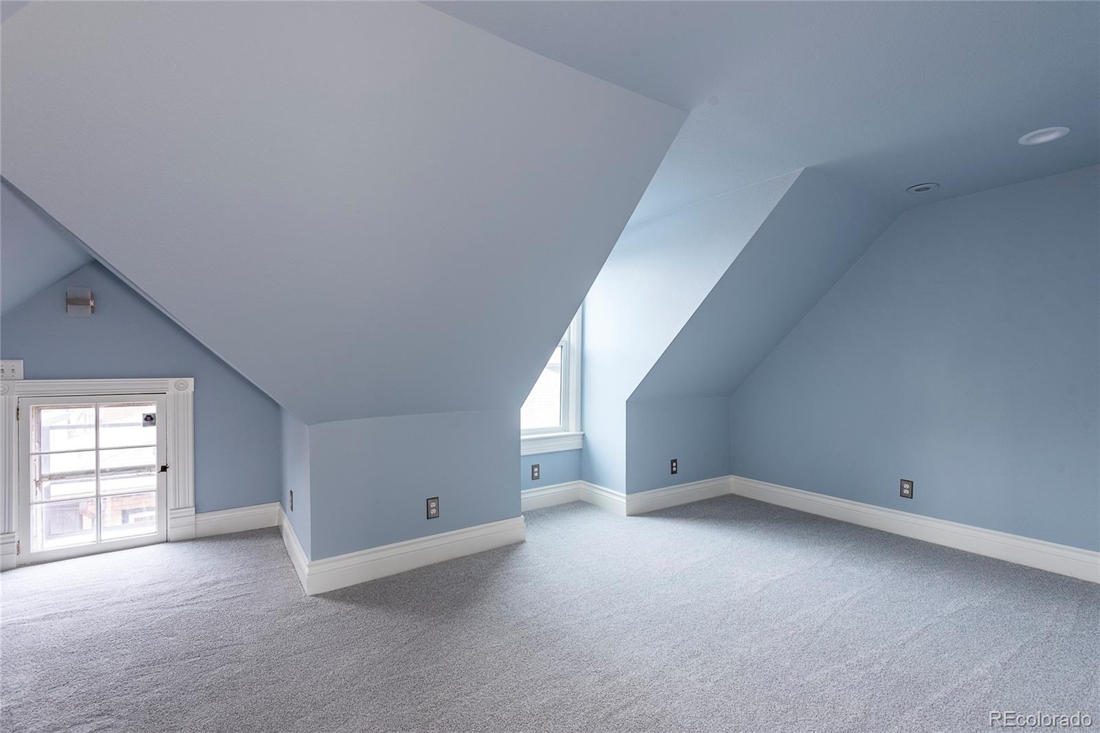 131 Sherman Street Denver, CO 80203 - Photo 28 of 36 an empty room with windows