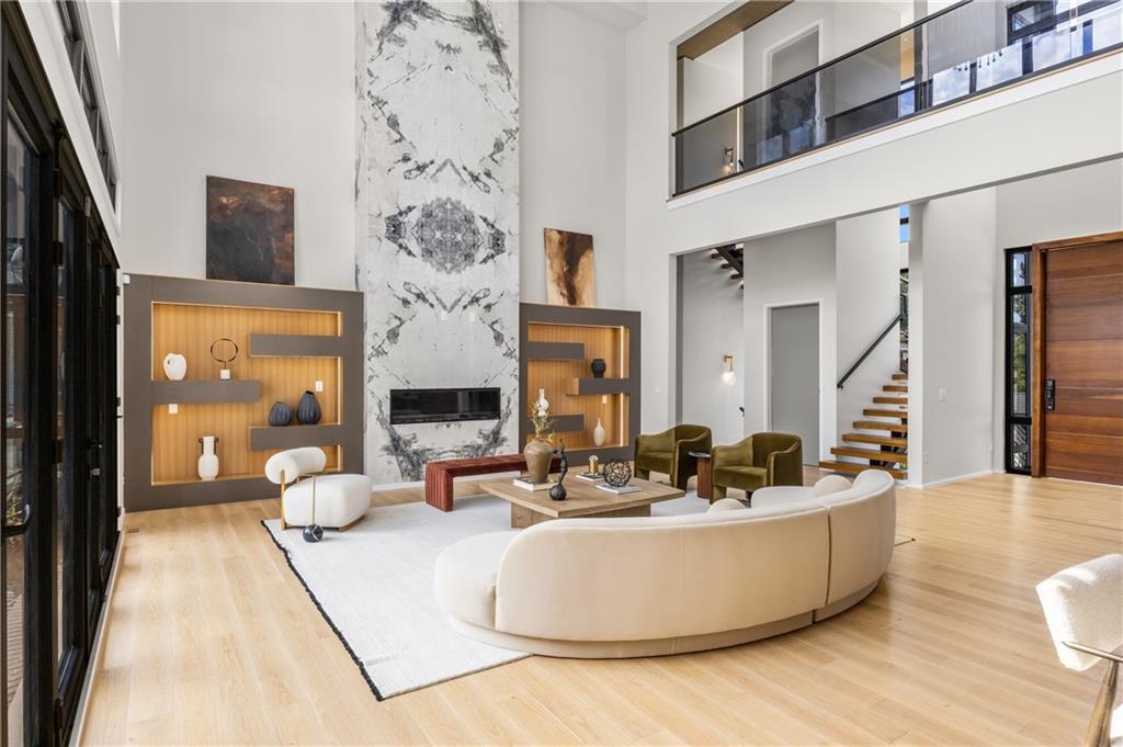 4232 Edgewood Court Marietta, GA 30068 - Photo 17 of 72 a living room with fireplace furniture and a large window