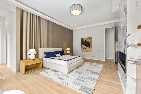 a living room with furniture and large window