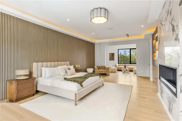 a view of a swimming pool with a lounge chairs