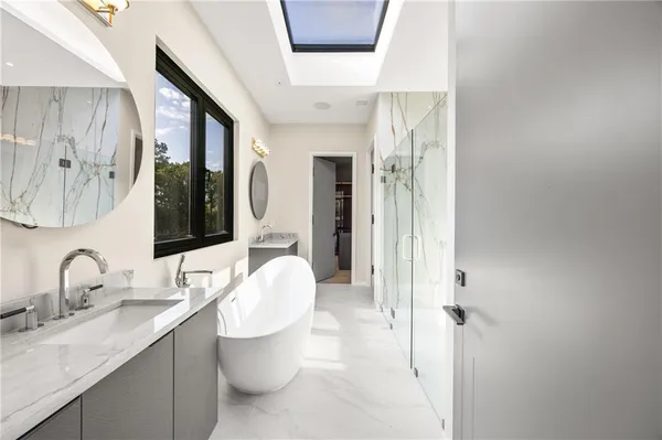 a view of a house with swimming pool and sitting area