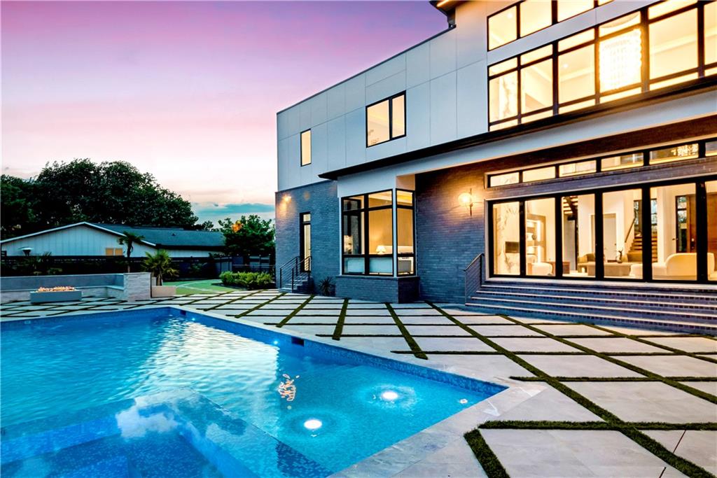 4232 Edgewood Court Marietta, GA 30068 - Photo 63 of 72 a view of a swimming pool with a lounge chairs