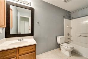 2112 Pecan Creek Drive Mesquite, TX 75181 - Photo 9 of 11 a bathroom with a sink toilet vanity and shower