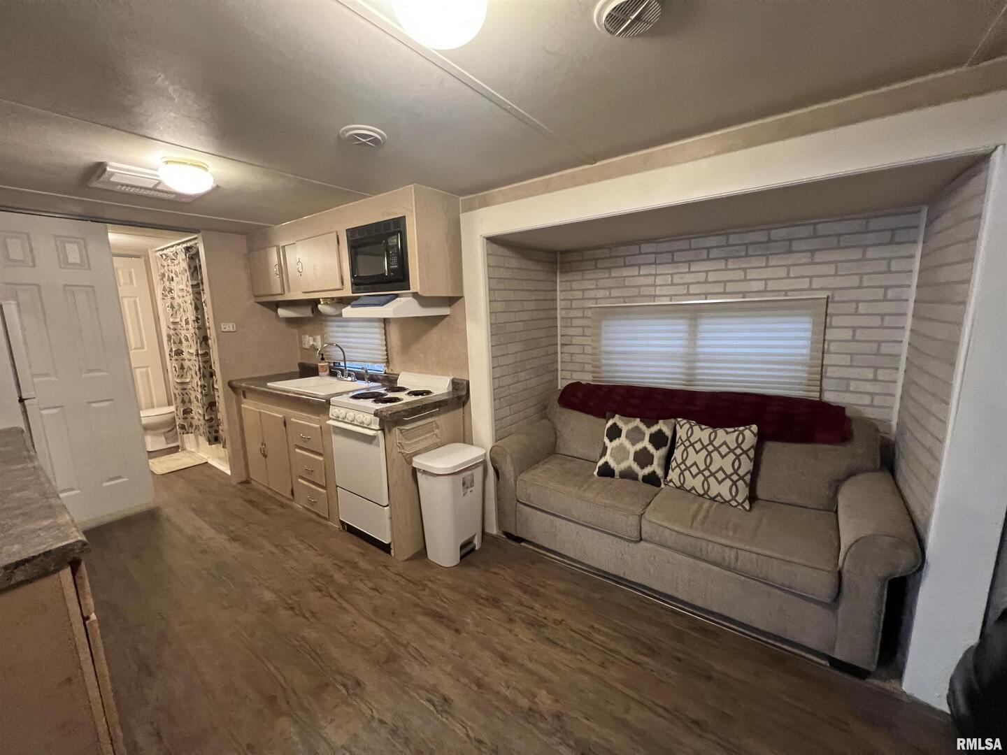 4 Victory Lane Marion, IL 62959 - Photo 12 of 26 a living room with furniture and a flat screen tv