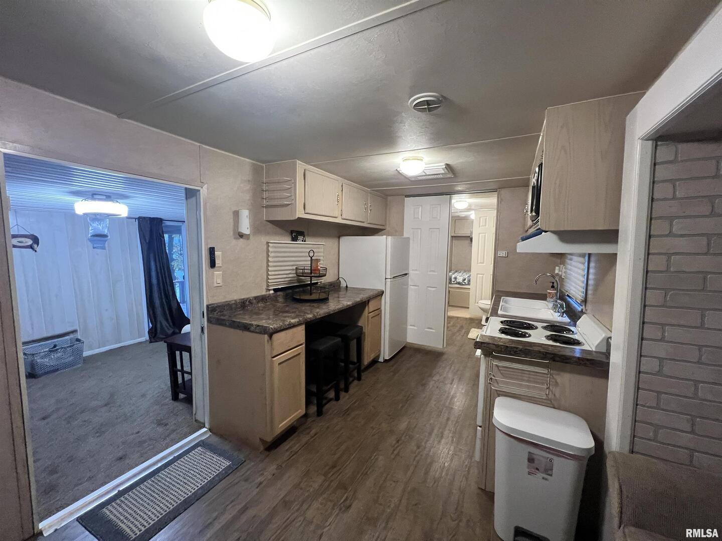 4 Victory Lane Marion, IL 62959 - Photo 13 of 26 a kitchen with stainless steel appliances a stove a sink and a refrigerator
