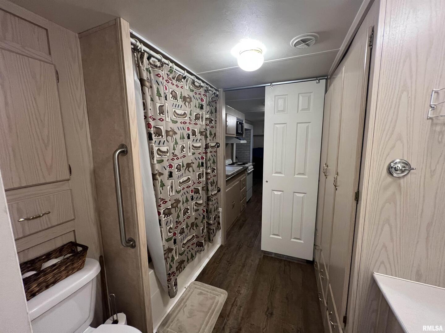 4 Victory Lane Marion, IL 62959 - Photo 19 of 26 a view of walk in closet with wooden floor