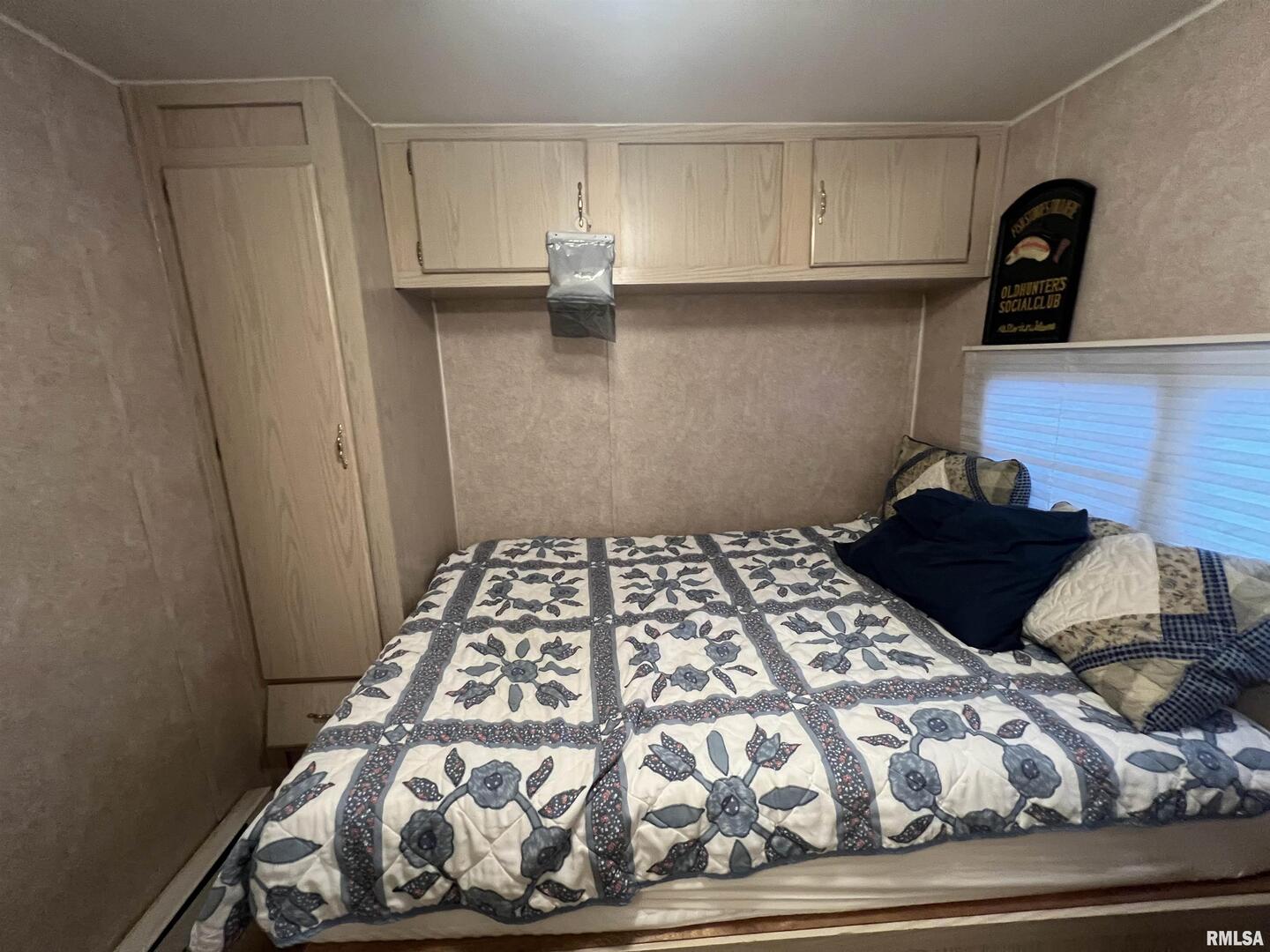 4 Victory Lane Marion, IL 62959 - Photo 21 of 26 a bedroom with a bed and a window
