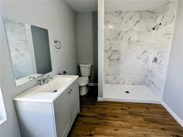 a bathroom with a sink and a shower