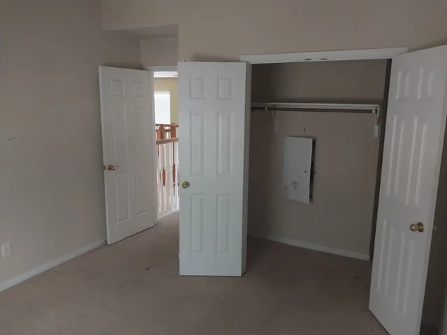 a bathroom with a bathtub and a window