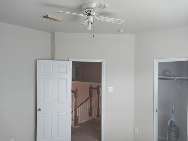 a room with furniture and window