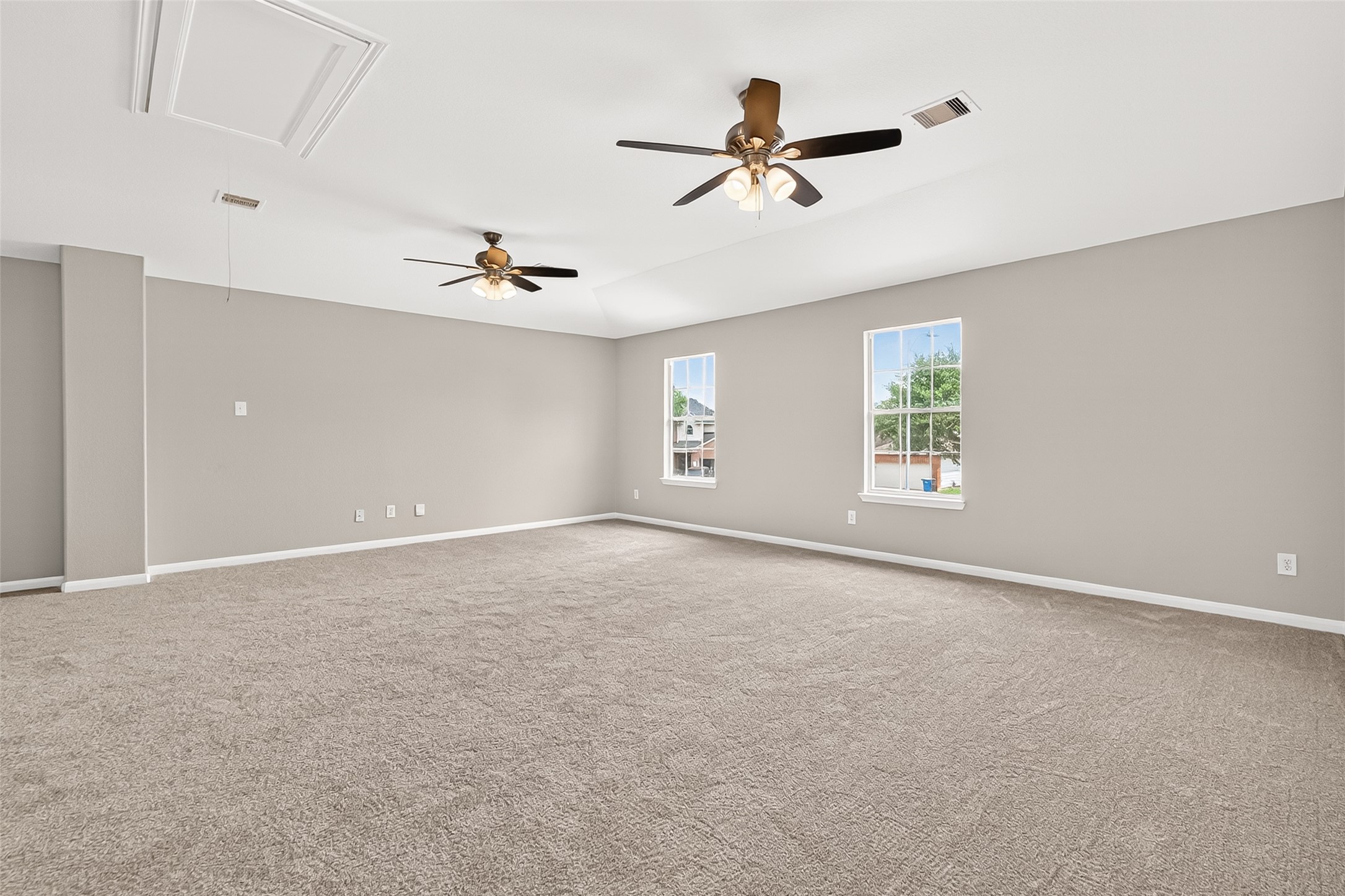 21327 Bella Flora Court Spring, TX 77379 - Photo 30 of 50 a view of a livingroom with a ceiling fan and window