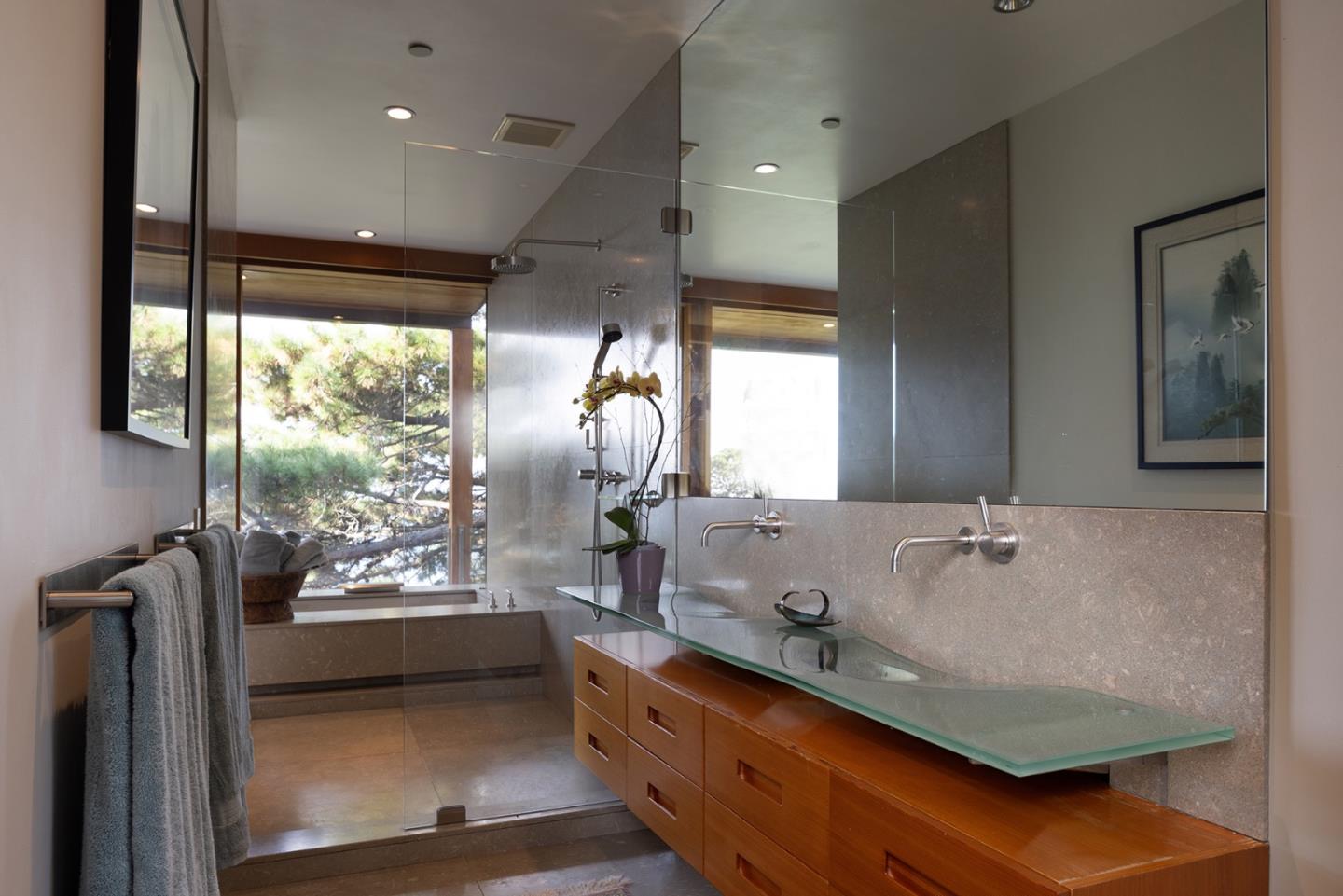 140 Boyd Way Carmel, CA 93923 - Photo 23 of 40 a bathroom with a double vanity sink and mirror