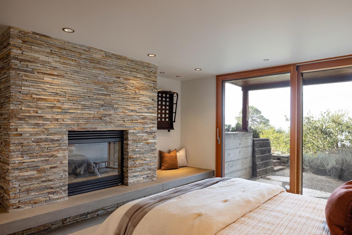 140 Boyd Way Carmel, CA 93923 - Photo 30 of 40 a bedroom with a bed and a fireplace