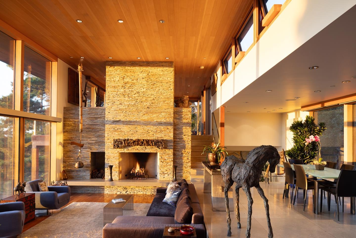 140 Boyd Way Carmel, CA 93923 - Photo 6 of 40 a living room with furniture a fireplace and a floor to ceiling window