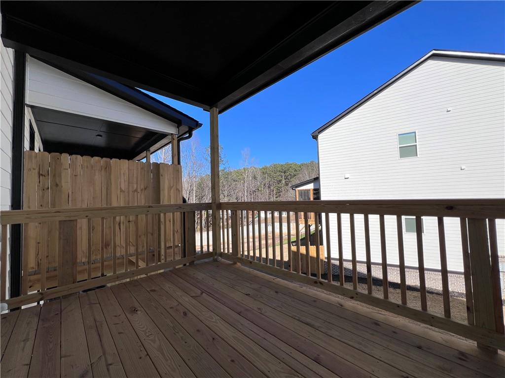23 Rock Pk Way, Unit 26 Tucker, GA 30084 - Photo 17 of 28 a view of balcony with wooden floor