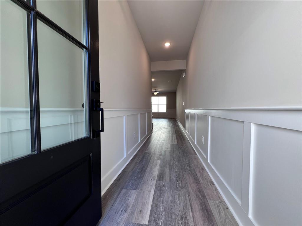 23 Rock Pk Way, Unit 26 Tucker, GA 30084 - Photo 3 of 28 a view of gallery with wooden floor