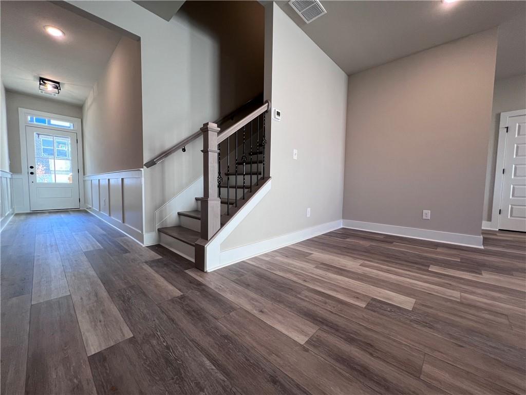 23 Rock Pk Way, Unit 26 Tucker, GA 30084 - Photo 5 of 28 a view of entryway and hall with wooden floor