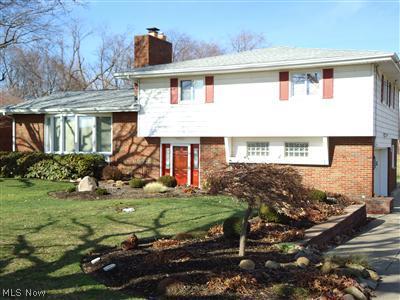 Easy maintenance exterior, lovely landscaped lot.