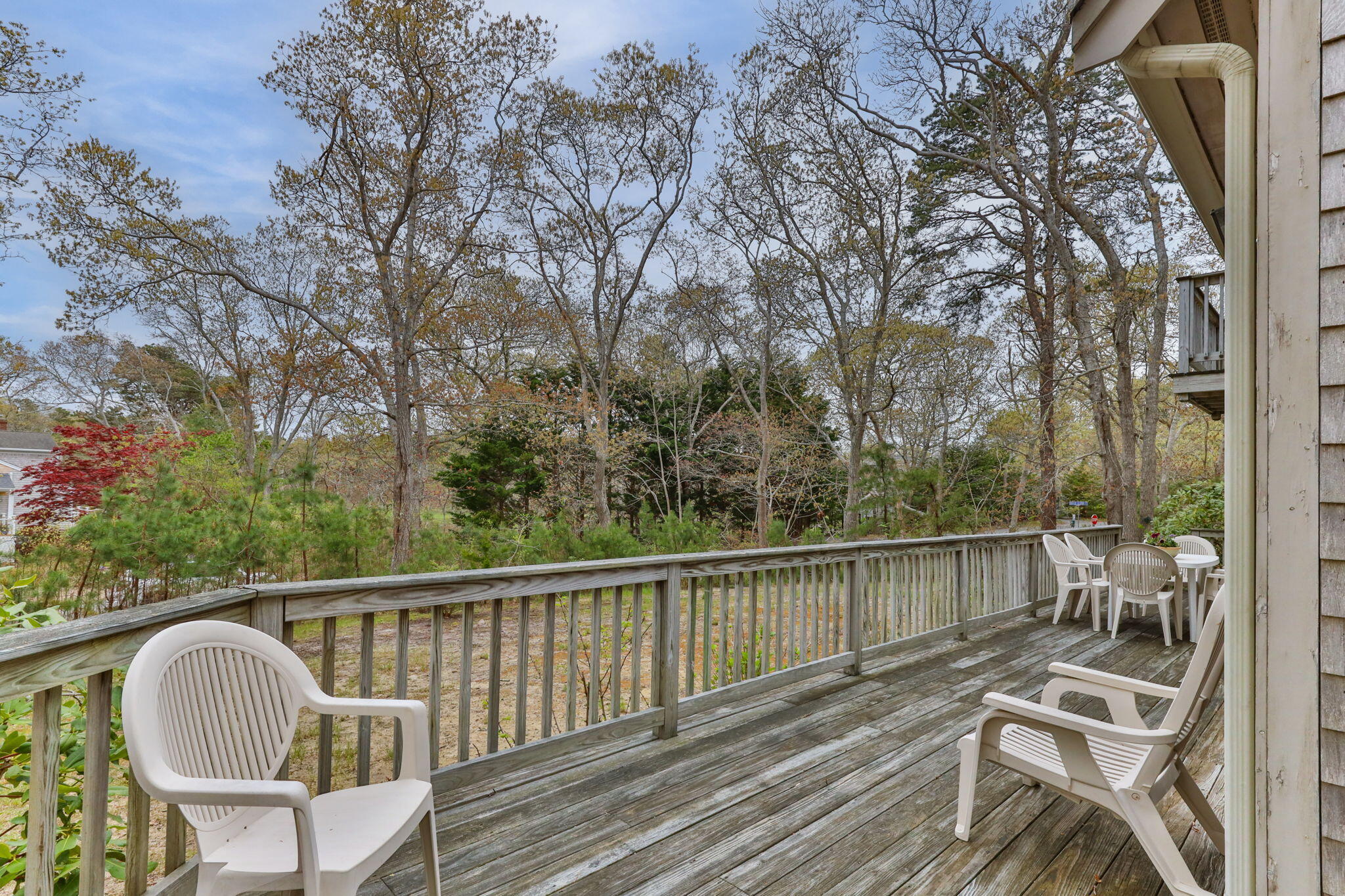 285 Blue Heron Road Wellfleet, MA 02667 - Photo 12 of 31 a view of a chair and table on the wooden floor