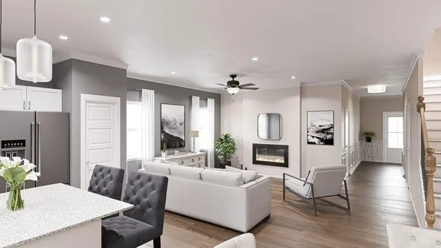 a living room with furniture fireplace and window