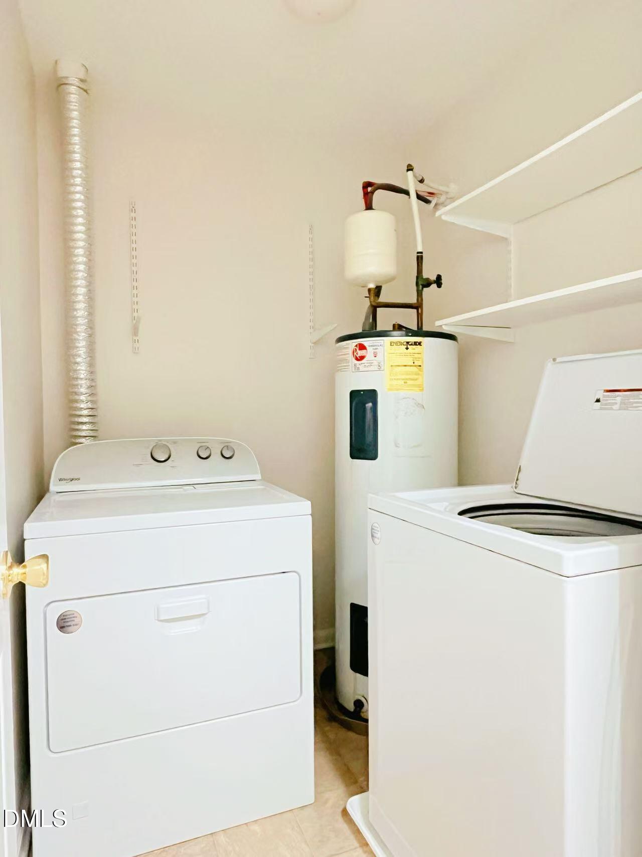 3040 Barrymore Street, Unit 108 Raleigh, NC 27603 - Photo 7 of 13 a utility room with dryer and washer
