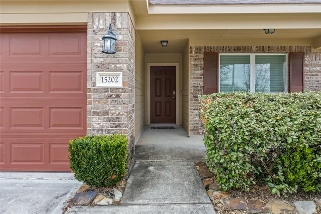a view of a hallway with white walls