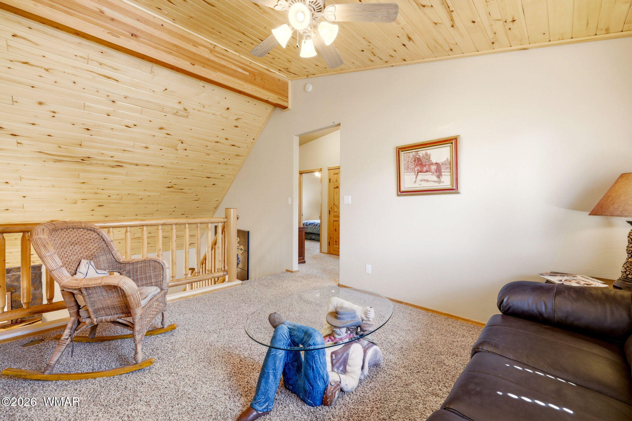 2877 Wahoo Road Overgaard, AZ 85933 - Photo 22 of 42 a living room with furniture and a chandelier