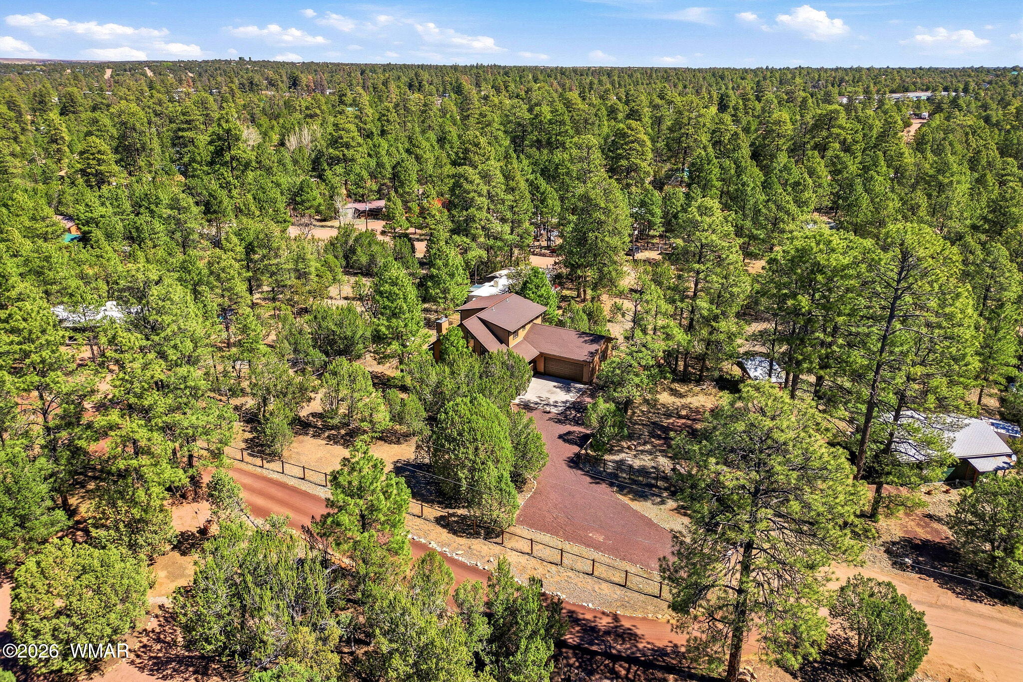 2877 Wahoo Road Overgaard, AZ 85933 - Photo 31 of 42 an aerial view of residential house with an outdoor space