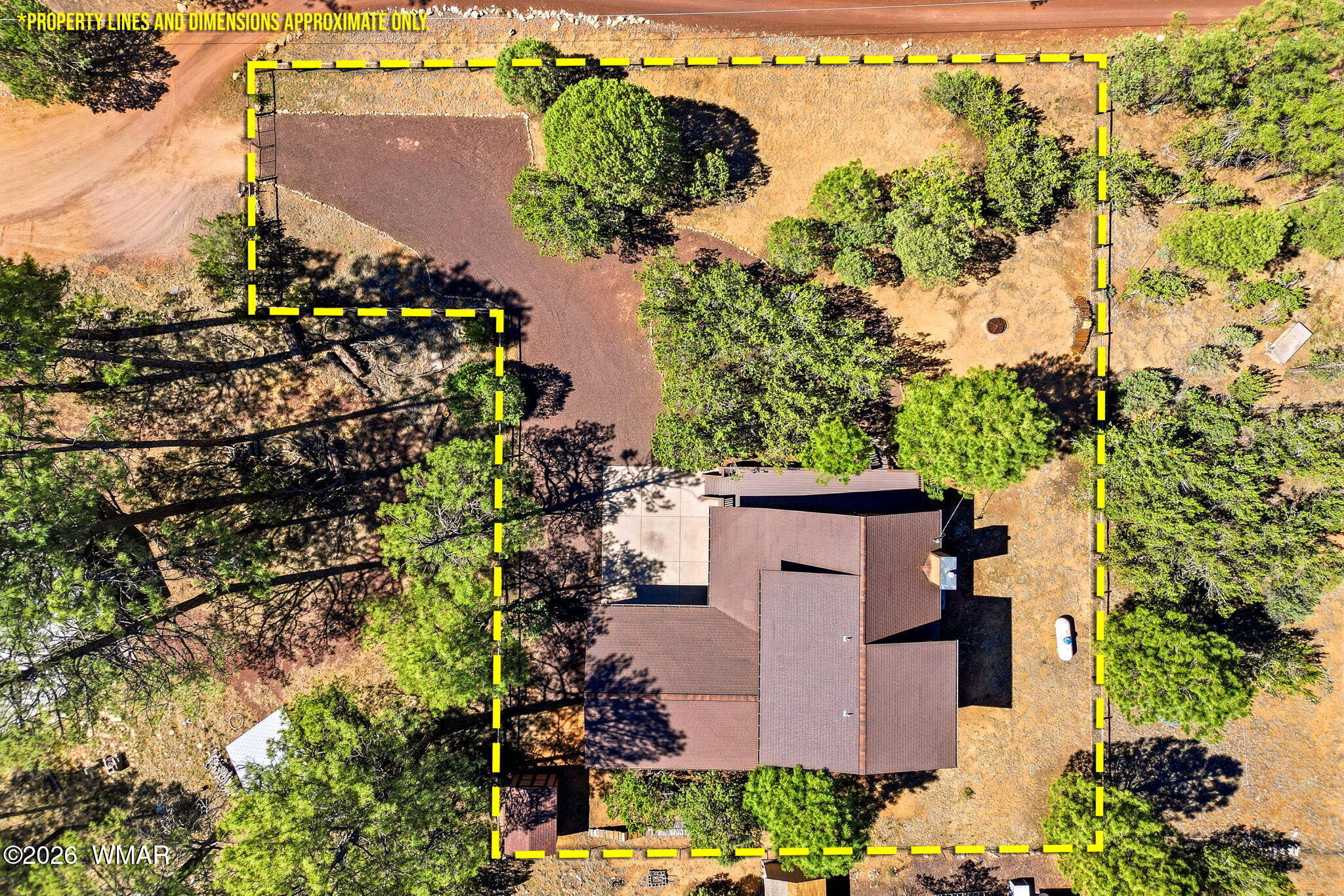 2877 Wahoo Road Overgaard, AZ 85933 - Photo 36 of 42 an aerial view of a house with a yard and lake view