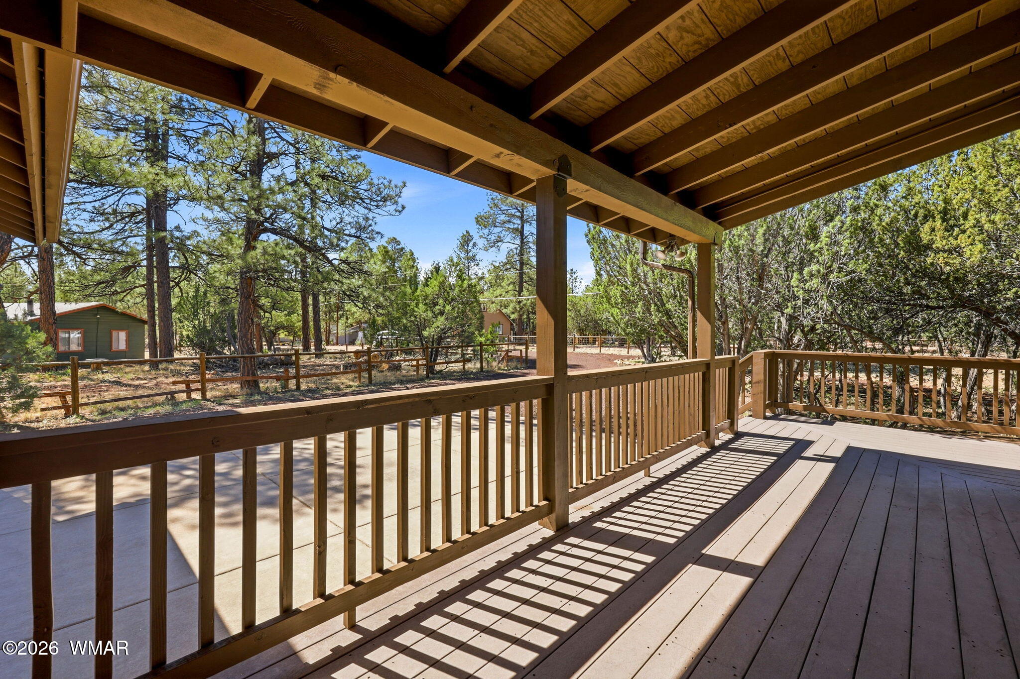 2877 Wahoo Road Overgaard, AZ 85933 - Photo 5 of 42 a view of balcony with wooden floor