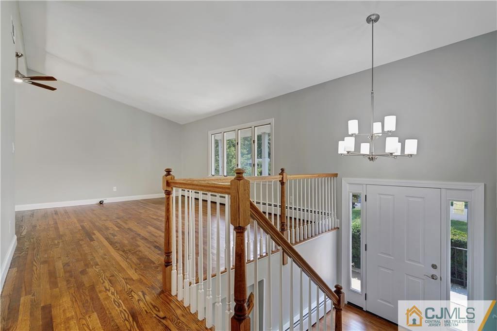 203 Riverbend Road Berkeley Heights, NJ 07922 - Photo 14 of 42 a view of a hallway with windows