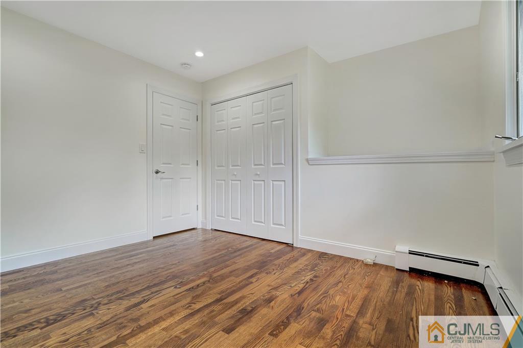 203 Riverbend Road Berkeley Heights, NJ 07922 - Photo 29 of 42 a view of an empty room