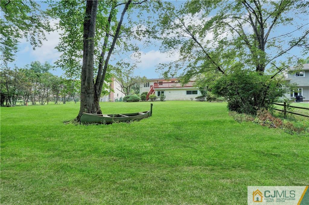 203 Riverbend Road Berkeley Heights, NJ 07922 - Photo 41 of 42 a view of a park with a tree