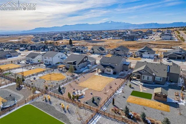 an aerial view of a city with lots of residential buildings