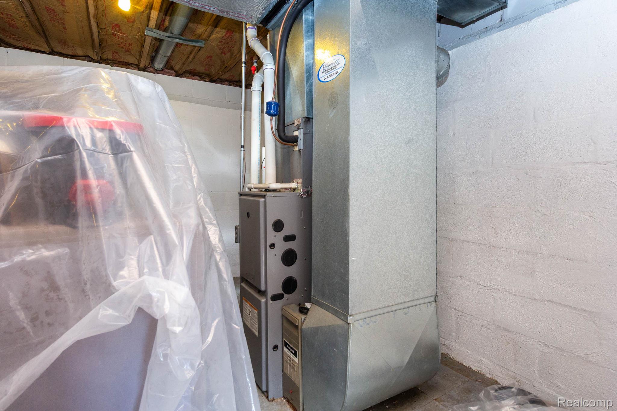 2559 Harrison Avenue Rochester, MI 48307 - Photo 23 of 32 Furnace and painted block walls