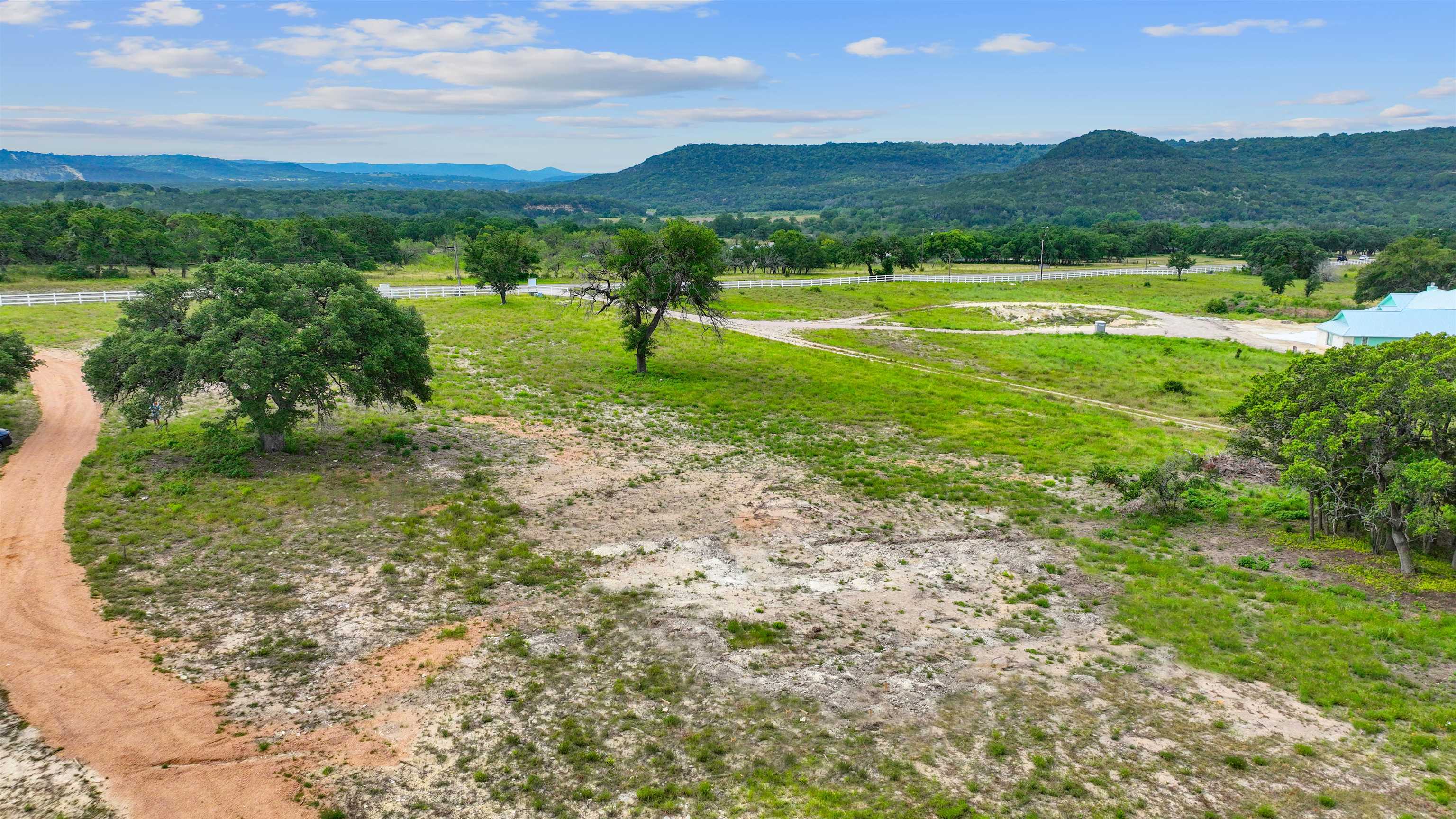 11288 Fm 1174 Bertram, TX 78605 - Photo 5 of 11 a view of a town with mountains & green space