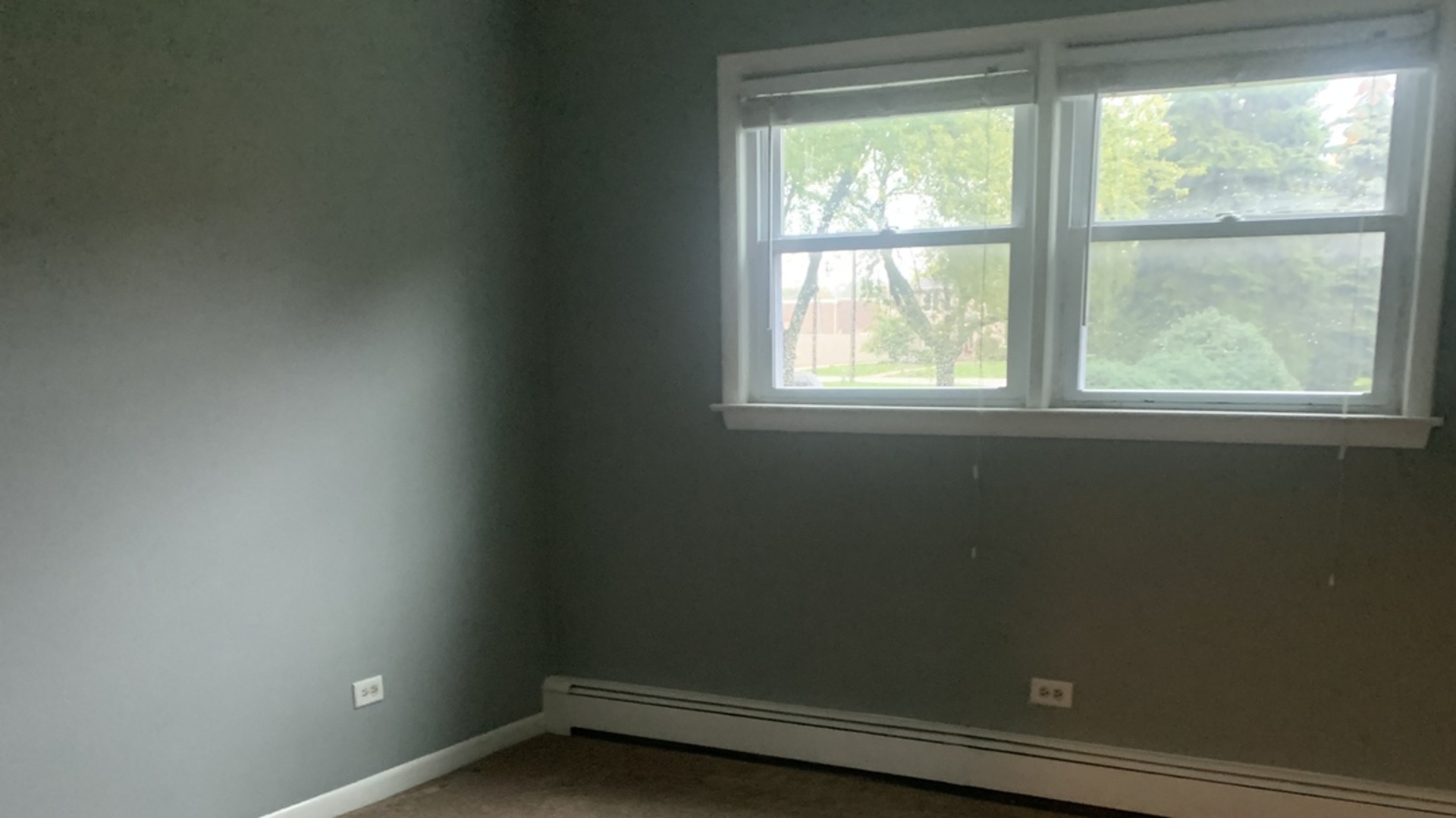 5631 6th Avenue, Unit 2D Countryside, IL 60525 - Photo 6 of 10 an empty room with a window