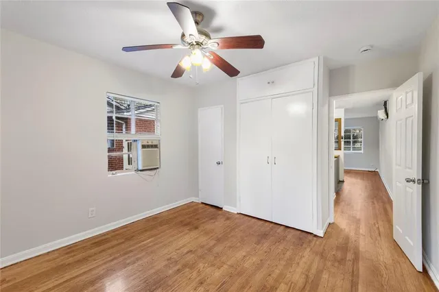 a view of livingroom with hardwood floor and ceiling fan