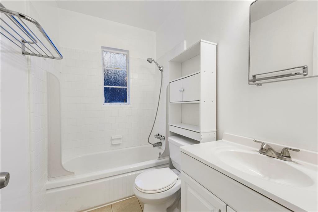 121 Fairview Street, Unit 2 Decatur, GA 30030 - Photo 3 of 11 a bathroom with a sink toilet and shower