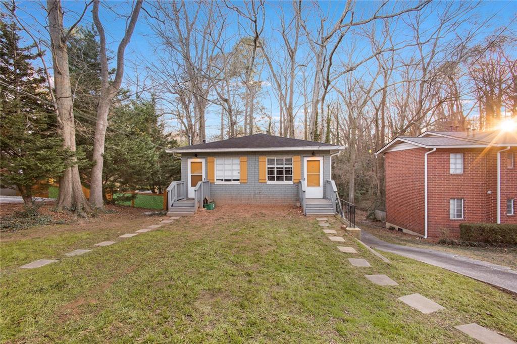 121 Fairview Street, Unit 2 Decatur, GA 30030 - Photo 9 of 11 a view of a yard with a large tree