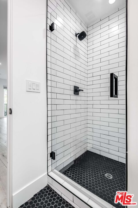 15330 Weddington Street Sherman Oaks, CA 91411 - Photo 15 of 30 a bathroom with a shower
