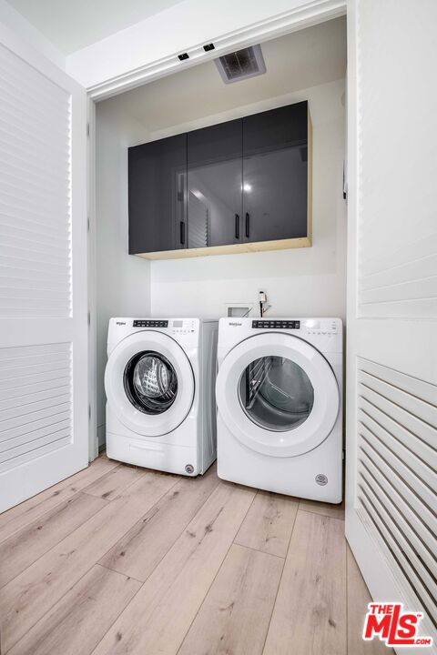 15330 Weddington Street Sherman Oaks, CA 91411 - Photo 16 of 30 a utility room with dryer and washer