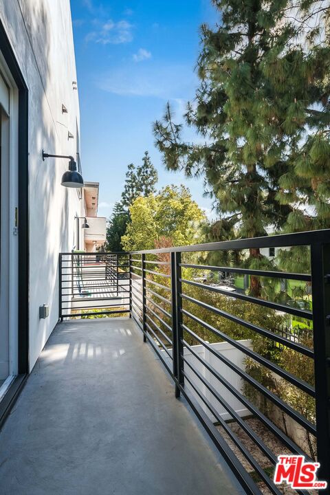 15330 Weddington Street Sherman Oaks, CA 91411 - Photo 28 of 30 a view of a balcony with an outdoor space