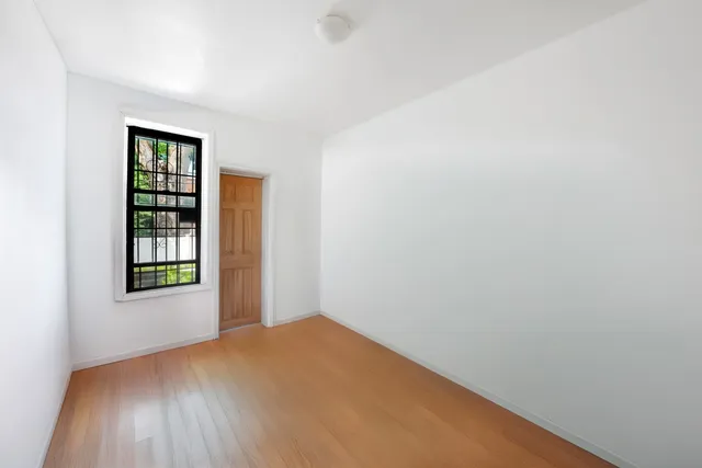 a view of an empty room with window