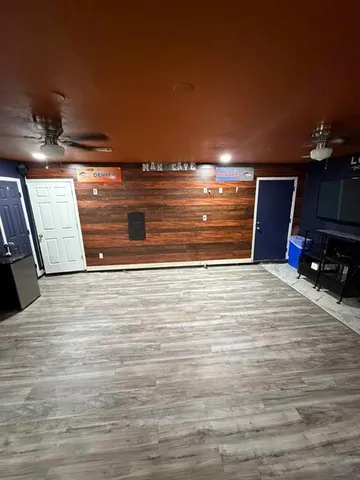 a view of room with stairs and a couch