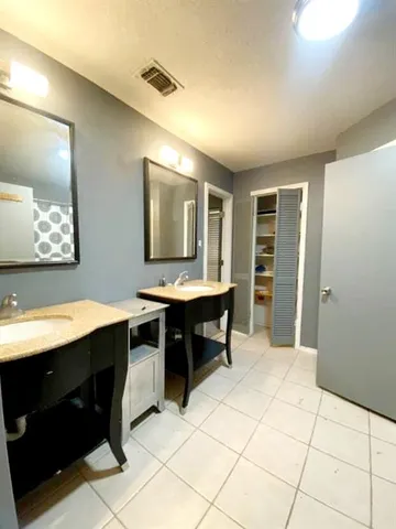 a view of a workspace with furniture