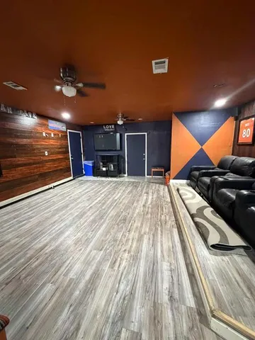 a view of a living room with a large window