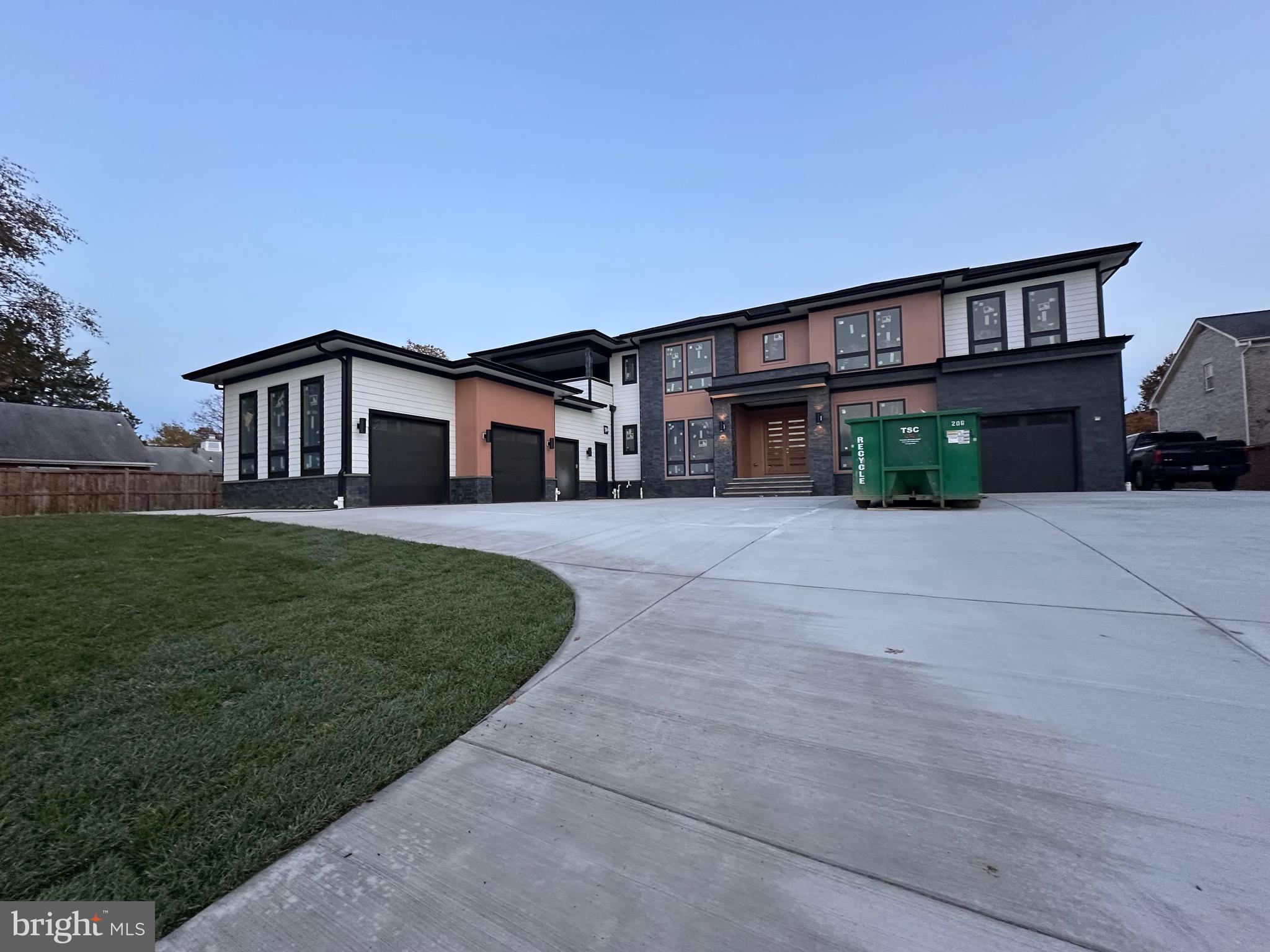 2113 Chain Bridge Road Vienna, VA 22182 - Photo 3 of 8 a house view with a garden space